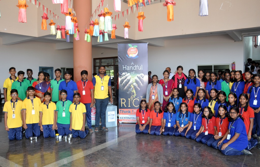 Students with Handful of Rice Banner